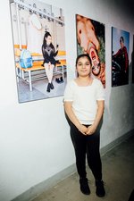 Programme release 2025 in the Fabrik 45: Dancer Lara in front of her portrait - © Nekame Klasohm